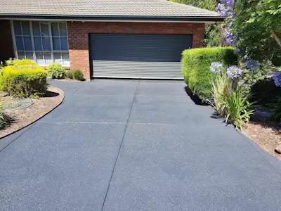 A driveway that has been sealed with our concrete sealers in Darwin